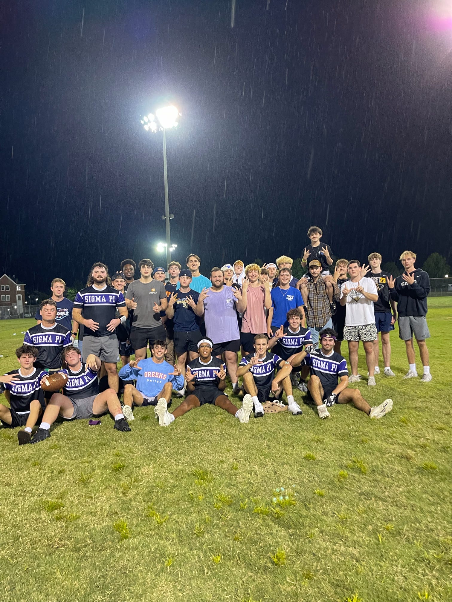 Theta-Omega brothers together after an intramural game